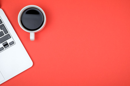 Red office desk table with computer top view with copy space Stock Photo