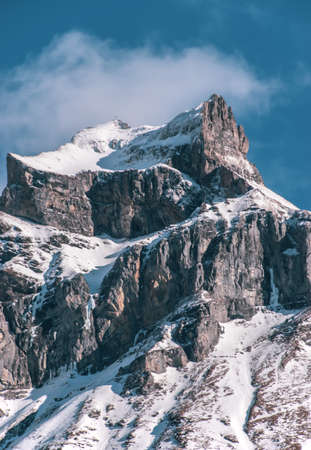 Snow covered mountain peaks of engelberg ski resort in switzerland Фото со стока