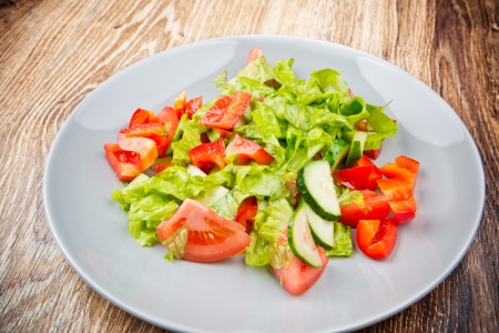 Organic vegetable salad on the wooden table Stock Photo