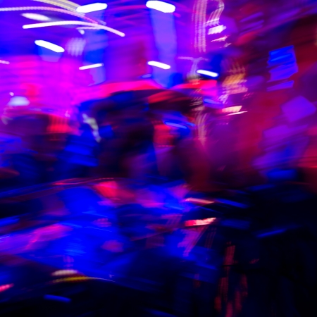 Dancing people in a disco cheery party