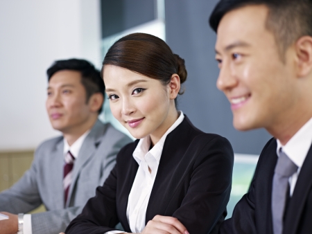 Asian business people at a meeting