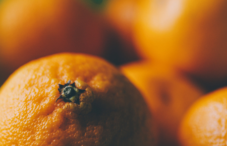 Mandarins in plate on home kitchen table Stock Photo