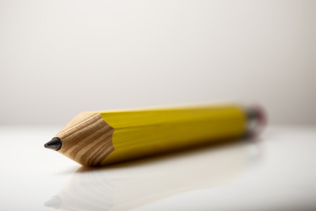 Large pencil on white background studio shot