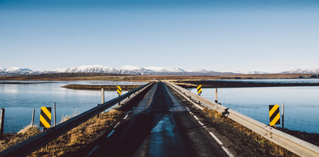 Icelandic lonely road in wild territory with no one in sight