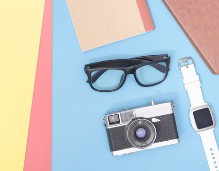 Hipster blogger travel objects on blue copy space for poster and banner Stock Photo