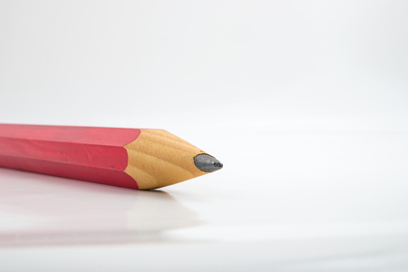 Big red pencil isolated on white background