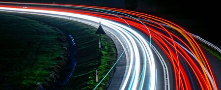 Lights of cars with night long exposure Stock Photo