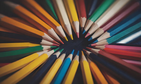 Colorful pencils on a black background shallow depth of field