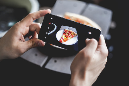 A young man and smartphone Stock Photo