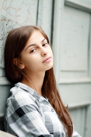 Portrait of a beautiful sad girl closeup outdoor