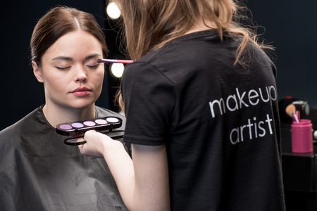 Make up artist applying eyeshadow