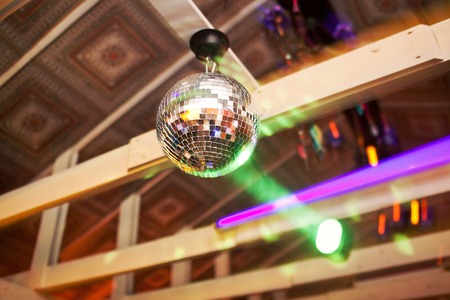 Mirror ball rolling in the night club Stock Photo