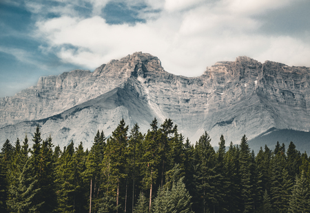 Empty street with mountain panorama in banff national park cana