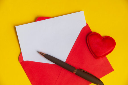 Love letter with white paper sheet in red paper envelope with customizable space for text love concept and copy space