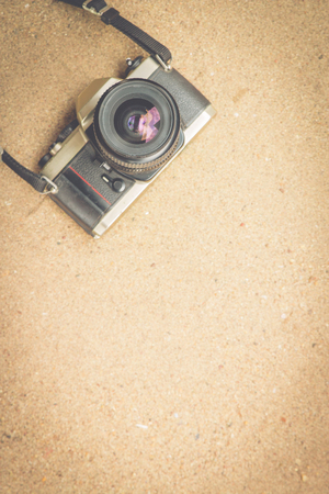 Old film cameras on the beach