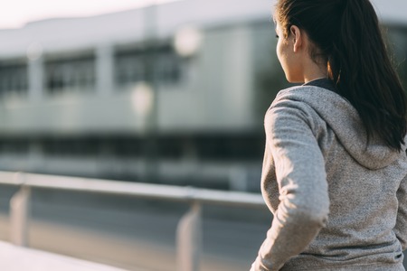 Woman running in city