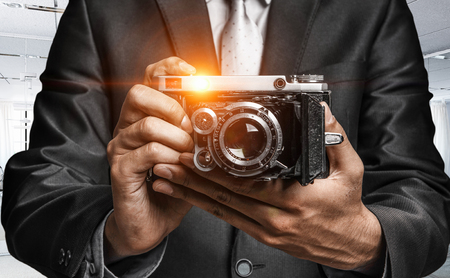 Man with camera in hands