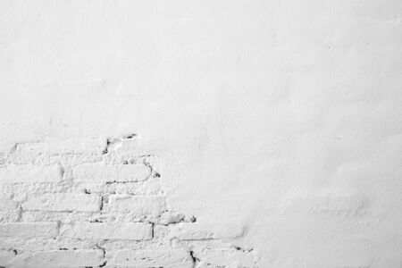 White concrete wall small cracks on the surface texture background