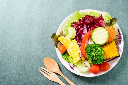 Top view of mixed vegetables salad on white dish ready for eating healthy food Stock Photo