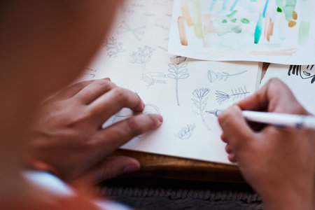 Get lost in the detail a young woman sketching at home