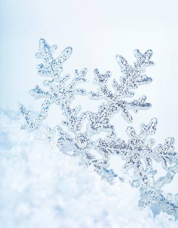 Beautiful blue snowflake winter holiday background