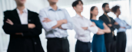 Panorama blurred group of businesspeople stand in line with cross arm gesture in modern corporate multiracial officer worker team bond and succeed together concord