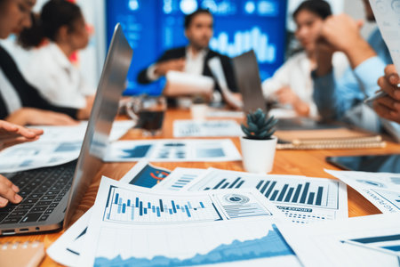 Piles of analyzed financial data dashboard on meeting table with background of business people analyzing data analysis market trend indication for strategic marketing investment plan habiliment Stock Photo