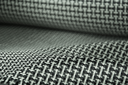 Black carbon fiber composite raw material background