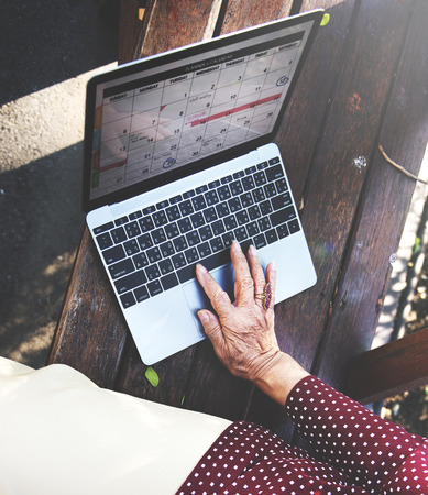 Social media senior adult browsing online concept