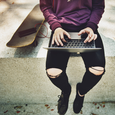 Young girl skateboad outdoors urban concept