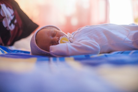 Sleeping newborn baby close up portrait