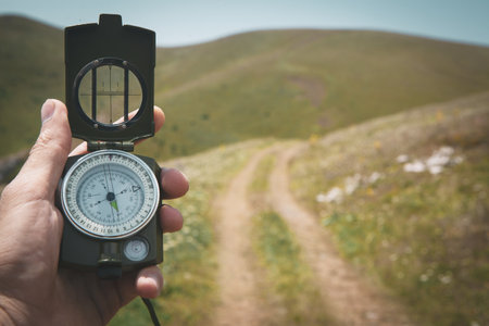 Compass in hand find way destination Stock Photo