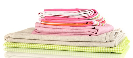 Pile of different fabrics isolated on white Stock Photo