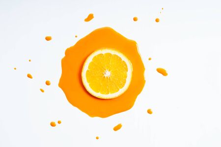 Orange fruit abstract in orange watercolor on white background freeform shape around sliced object top view