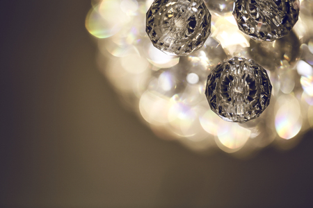 Close up on crystal glass glittering chandelier