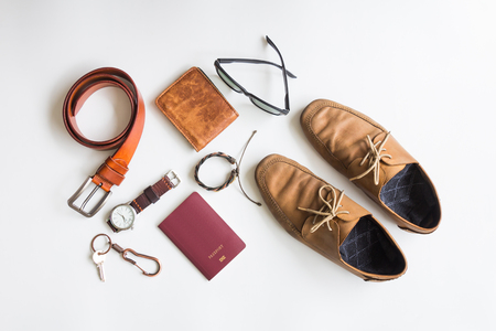 Men s accessories and essential travel items on white background flat lay fashion and beauty concept