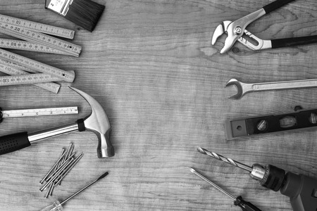 Assorted work tools on wood