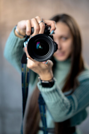 Beautiful young girl with photo camera Stock Photo