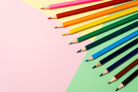 Set of color pencils on background of colored paper children creativity or school concept Stock Photo