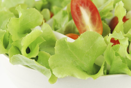 Vegetable salad bowl on white background Stock Photo