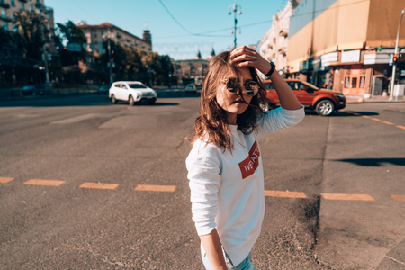 Young girl on the city street Stock Photo