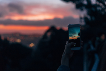 Young woman taking photo