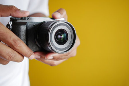 A men is taking pictures on a camera Stock Photo