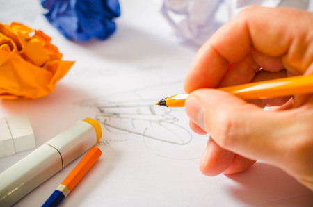 A designer drawing sketches Stock Photo