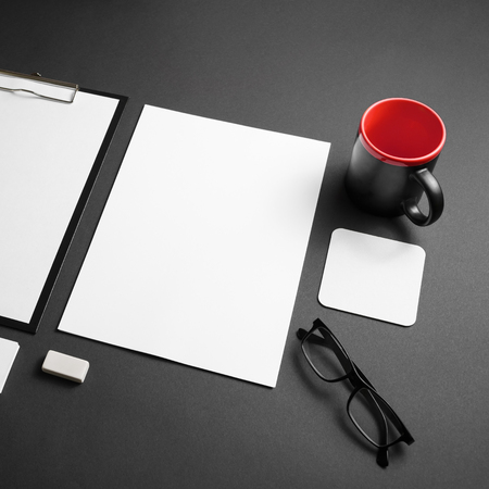 Blank corporate stationery set on black paper background branding mock up Stock Photo