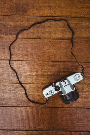 View of an old camera on wood desk Stock Photo