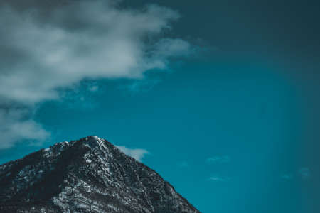 The high mountains covered with snow in the evening