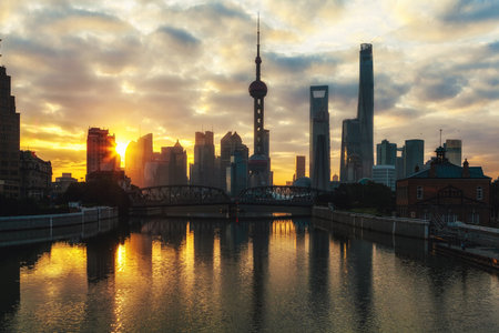 The shanghai city centre reflected on huangpu river Stock Photo
