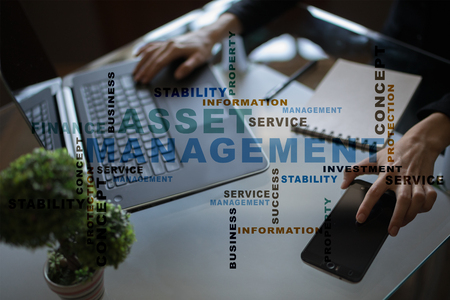 Asset management on the virtual screen business concept words cloud Stock Photo