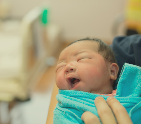 Asian newborn at hospital Фото со стока